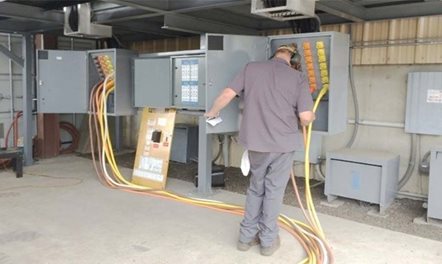 connecting cables to prepare for the load test